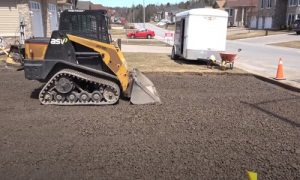Paving Simcoe County clearing the driveway to add interlocking bricks