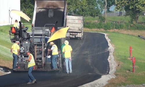 Simcoe Paving asphalt paving workers on a road